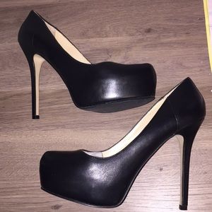 Black Aldo genuine leather platform heels